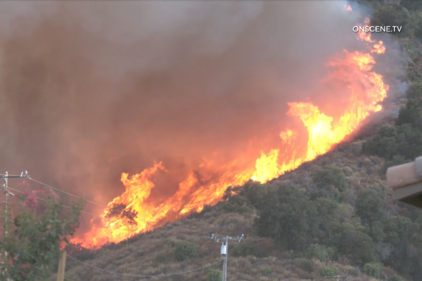 Macy fire gains ferocity, threatening homes near Lake Elsinore