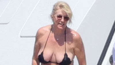 Penny Lancaster, 53, wows in a tiny black bikini