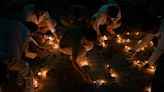 Indians demand justice in candlelight march for murdered doctor