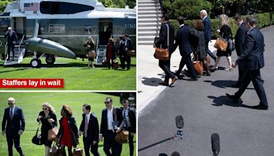 Biden, 81, has aides flank him on walks to Marine One to block cameras from catching him shuffling, stumbling: report