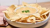 Why White American Cheese Works Best When Making A Smoky Queso Dip