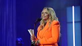 Miranda Lambert Embraces Statement Color in Orange Minidress at ACM Honors 2022