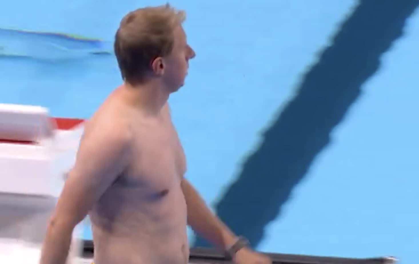 Watch: ‘Bob the cap catcher’ dives into the Olympic pool – in his colourful budgie smugglers