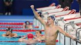 Longtime Phelps coach Bob Bowman was in tears watching new star pupil Leon Marchand win gold