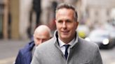 Michael Vaughan cleared of using racist language as former team-mates charged