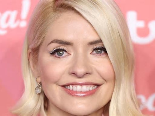 Holly Willoughby stuns in plunging black dress for glamorous video