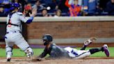 Mets' 9th-inning challenge ruled unsuccessful as Cubs steal a victory with wild ending
