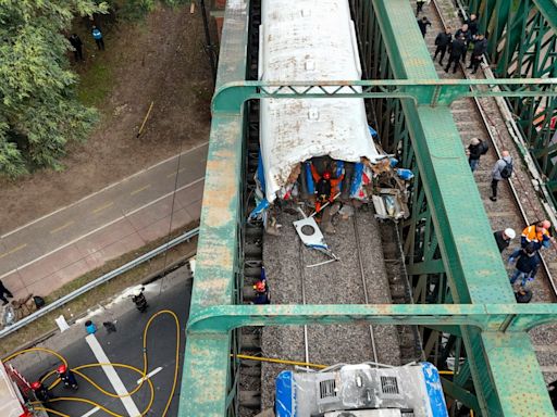 A train in central Buenos Aires strikes a boxcar on the track, injuring dozens