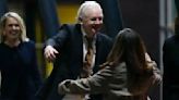 Watch: Julian Assange hugs wife and father as he returns home after 14 years | World News - The Indian Express