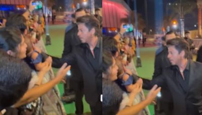 Shah Rukh Khan pauses to greet a Baby Girl amidst a huge crowd on the IIFA green carpe, Watch Viral video