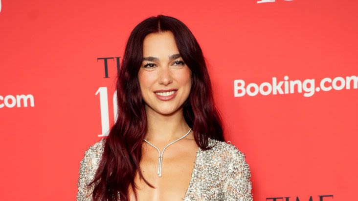 Dua Lipa Wore a transparent Chanel Dress Embroidered With Crystals