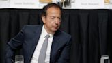 Elite investor John Paulson claims in a new lawsuit that his ex-business partner duped him out of millions to fund Louis Vuitton shopping sprees and Las Vegas parties