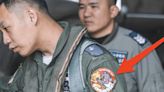 Photo catches Taiwan pilot with a patch of Winnie the Pooh getting punched in the face — a jab at China's Xi as Beijing ups the pressure