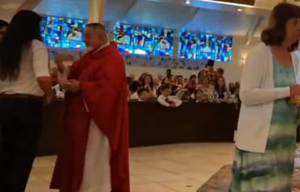 Priest bites woman at Mass after denying her communion, police say