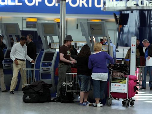 Heathrow baggage chaos as British Airways passengers left without belongings and stranded for hours due to IT failure