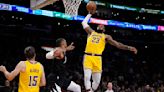 LeBron James’ big night carries Lakers past Clippers in overtime as James Harden trade is made official