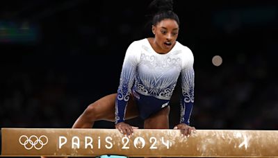 Simone Biles falls off beam then picks herself up to land floor silver medal at Paris 2024