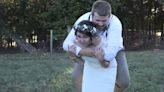 Watch the moment bride gives hubby piggyback but it goes horribly wrong