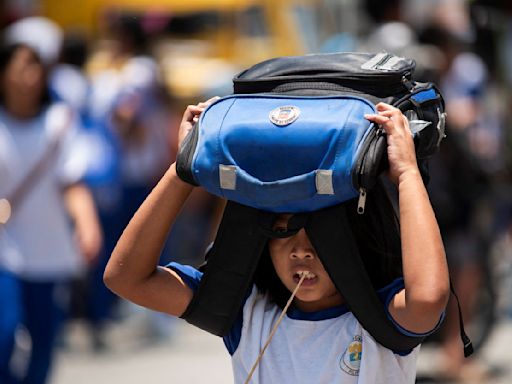 In Philippine classrooms, weather's too hot to handle