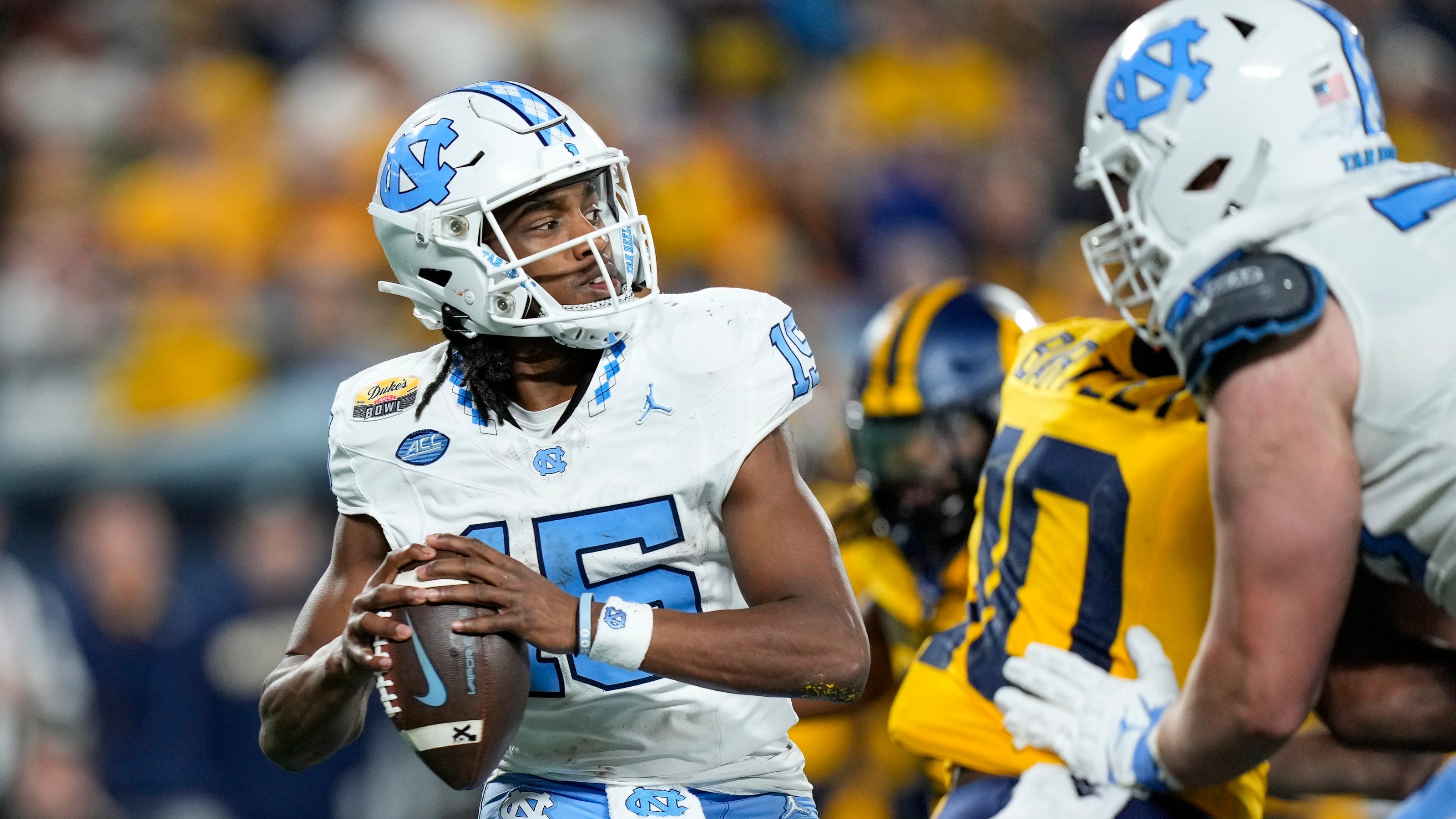 UNC football quarterbacks Conner Harrell, Max Johnson battle at Tar Heels' spring game