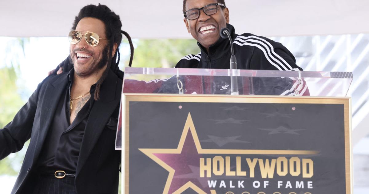 Lenny Kravitz answers video call from 'big brother' Denzel Washington onstage in Italy