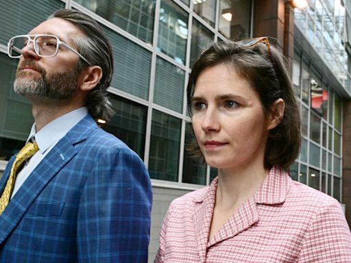 Tearful Amanda Knox says she is 'a victim' and vows to fight slander re-conviction