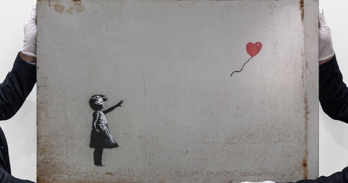 Banksy's famous Girl With Balloon stolen during daring heist on London gallery