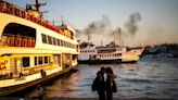 AP PHOTOS: Voters to turn a new page in the history of Istanbul, guardian of the Bosphorus