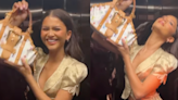 Zendaya recreates Naomi Campbell’s iconic Louis Vuitton 2004 advertisement in elevator