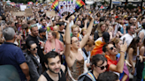 Tens of thousands rally against transphobia at Paris Pride March