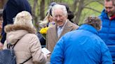 King and Queen greet well-wishers as they arrive for Sandringham church service