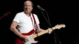 “Somebody handed me Mariah Carey’s record and said, ‘Would you sign this?’” How Adrian Belew ended up on a number one single without even knowing