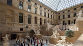 Parisians warm up for Olympics with workouts in Louvre museum