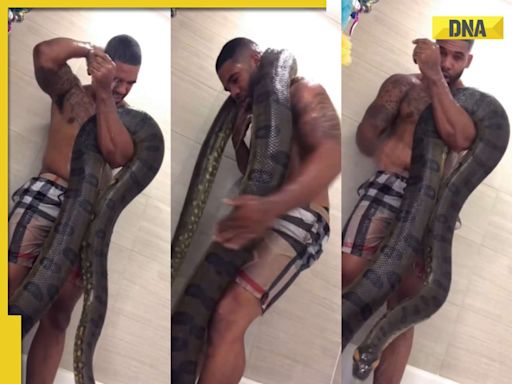 Man bathes with massive python in terrifying viral video, watch