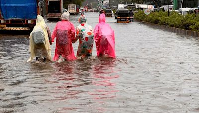 Four dead and flights cancelled as Mumbai gets flooding red alert after heavy rains