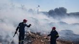 A wildfire on the fringes of the Greek capital triggers evacuation alerts