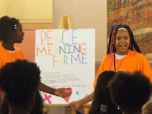 Peace campers demonstrate at Kansas Statehouse, promoting peace and second chances