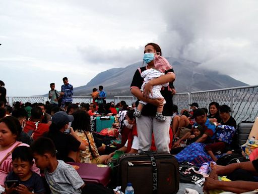 Indonesia volcano eruptions force thousands to evacuate as airlines cancel flights