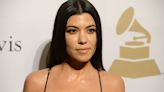 Kourtney Kardashian Rocks Velvet Coat and Little Else Almost 2 Months After Giving Birth