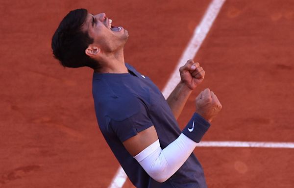 Carlos Alcaraz outlasts Jannik Sinner in five-set thriller to reach French Open final