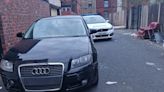 Police chase Audi with 'false plates' through Bury before suspects plough into another car and flee