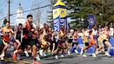 Switzerland's Hug recovers from crash to win 7th men's wheelchair race at Boston Marathon