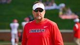 Auburn hires Liberty’s Hugh Freeze, who’s coming back to SEC