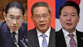 Japan, South Korea, China seek to ease friction at trilateral summit