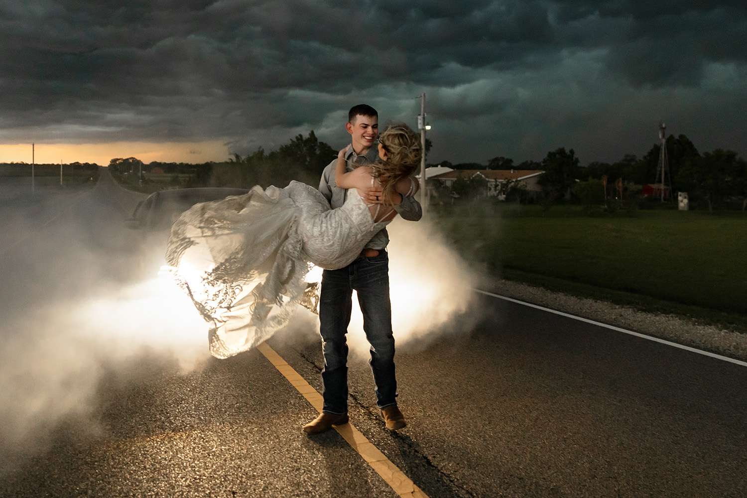 Newlyweds Pose for Dramatic Wedding Photos Outside as Thunderstorm Approaches