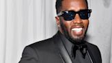Diddy Shares First Picture Of Newborn Daughter In Christmas Family Photo