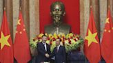 Xi Asks Vietnam to Stop Outsider Efforts to ‘Mess Up’ Region