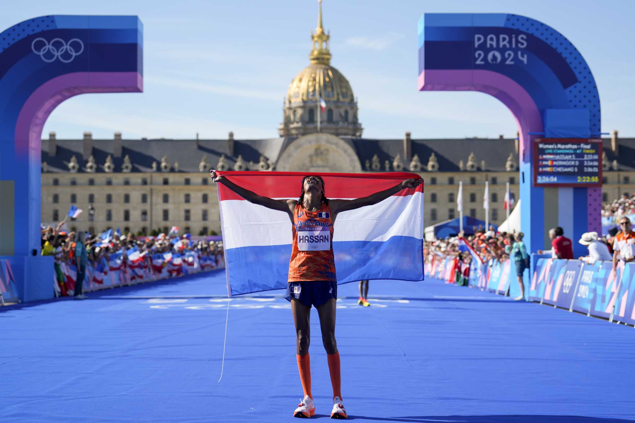 Sifan Hassan wins women's marathon at Paris Olympics after trading elbows with Tigst Assefa