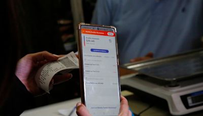 Comienzan pagos del Bolsillo Familiar Electrónico reactivado: revisa con tu RUT si te corresponde - La Tercera