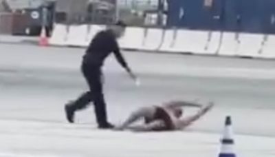 Moment shirtless man leads cops on wild chase across tarmac at LAX